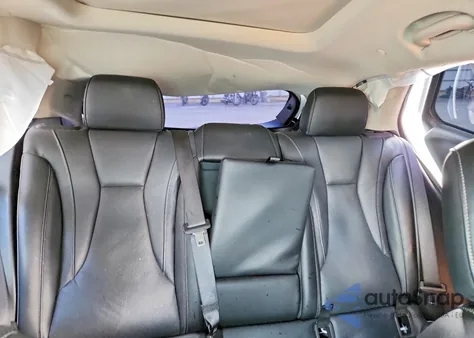 2021 Buick Envision Essence z USA, uszkodzony, nr VIN LRBFZNR4XMD119402